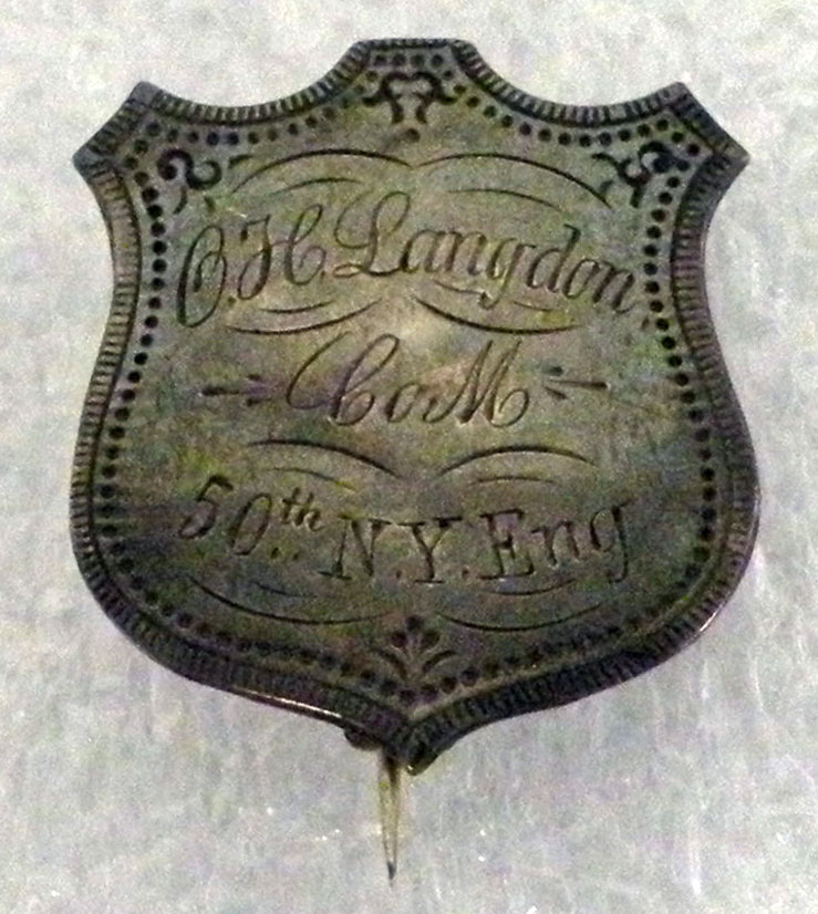 This Civil War identification badge was worn by Charles Langdon of the 50th New York Engineer Regiment.